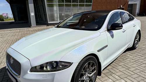 Забронировать белый Jaguar XJ на свадьбу